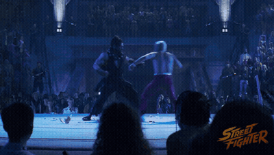 Crowd Watching Street Fighter Wrestling Match GIF