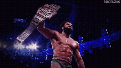 Crowd Watching Wrestling Match With Smack Down Shirt GIF