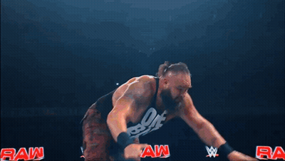Crowd Watching Wrestling Match With WWE Shirt GIF