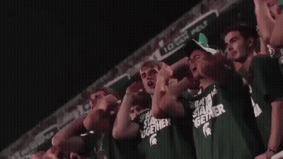 Crowd Wearing Green Shirts Saying Stand Together GIF