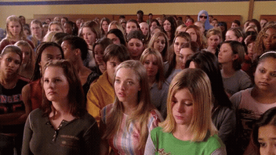 Crowd With Girl In Angel Shirt GIF