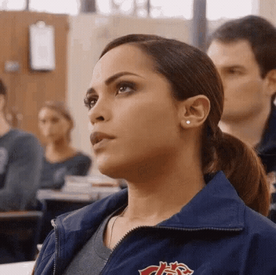 Crowd With Man Wearing Uf Shirt GIF