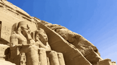 Crowned Man Statue On Rock GIF