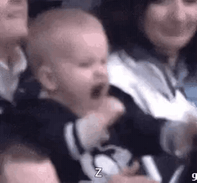Crying Baby Held By Woman GIF