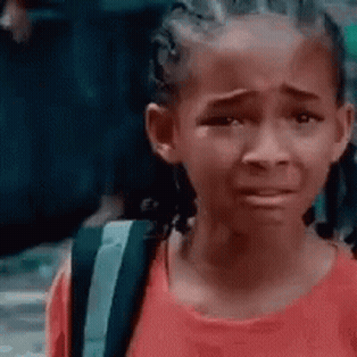Crying Girl In Red Shirt With Backpack GIF