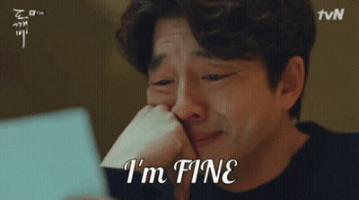 Crying Man Holding Paper Saying I'm Fine GIF