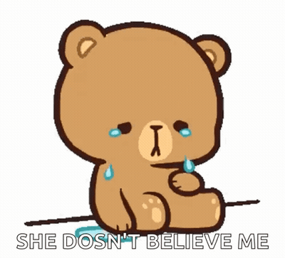 Osito de peluche llorando sosteniendo un corazón dice Ella no me cree GIF
