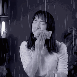 Crying With Money While Raining GIF