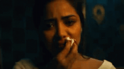 Crying Woman Holding Paper GIF