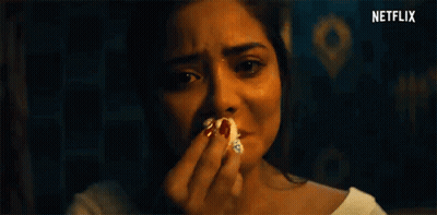 Crying Woman Holding Piece Of Bread GIF