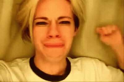 Crying Woman Making Funny Face In White Shirt GIF