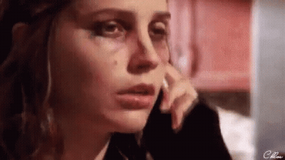Crying Woman On Phone GIF