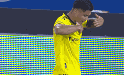 Cucho Hernandez Brushing Off His Shirt GIF