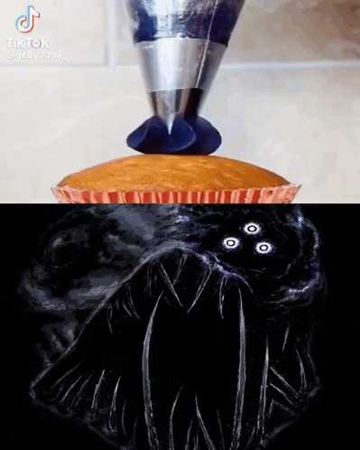 Cupcake With Blue Frosting And Three-Eyed Monster GIF