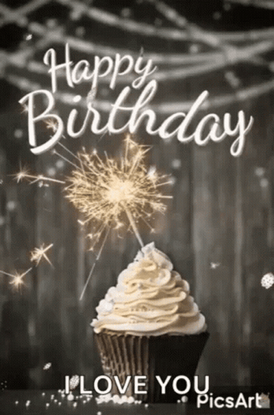 Cupcake With Whipped Cream And Sparklers GIF