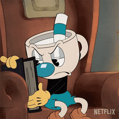 Cuphead Is Sitting In A Chair Holding A Book And Giving A Thumbs Up Sign GIF