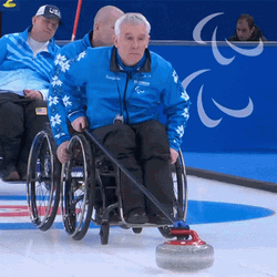 Curling In Wheelchair GIF