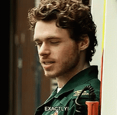 Curly Bearded Man In Green Uniform Saying Exactly GIF