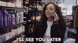 Curly Girl Saying See You Later On Phone GIF
