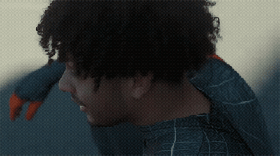 Curly Hair Man In Blue Spider Web Shirt GIF