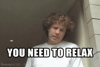 Curly Hair Man in White Shirt Says You Need to Relax