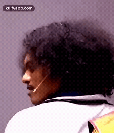 Curly Hair Man With Microphone In Mouth GIF