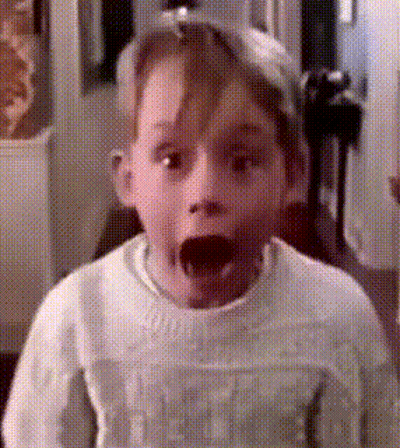 Curly Hair Woman In Denim Jacket And Bra Making Funny Face GIF