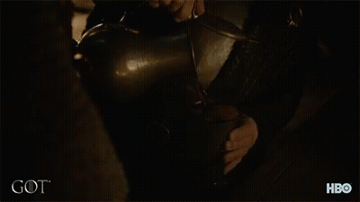 Curly Haired Bearded Man By Fire Got GIF