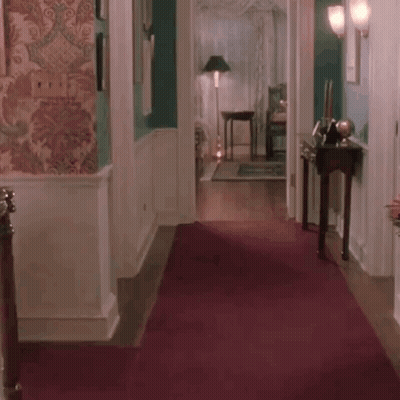 Curly Haired Bearded Man On City Street GIF