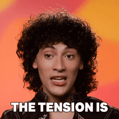 Curly Haired Man Saying The Tension Is GIF