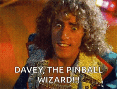 Curly Haired Man Says Davey The Pinball Wizard GIF