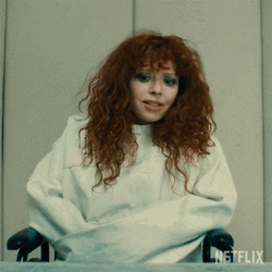 Curly Lady Pulling Straight Jacket GIF