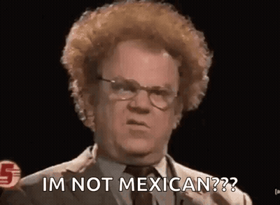 Curly Man With Glasses Says Im Not Mexican GIF