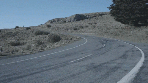 Curvy Road With White Line On Right Side GIF