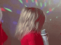 Cute And Little Diva Girl Holding Microphone GIF
