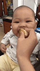 Cute Baby Eating Sour Patch Kids GIF