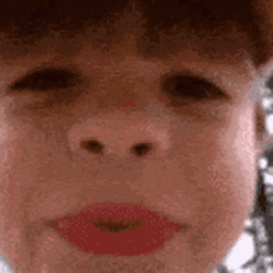 Cute Baby Spit To Camera GIF