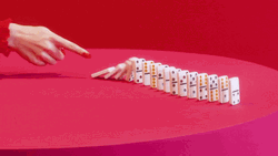 Cute Boomerang Dominos Falling GIF