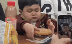 Cute Boy Enjoy Eating Whopper Burger  GIF