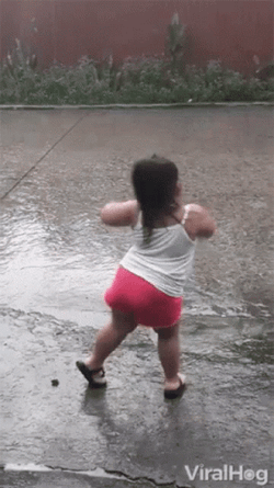 Cute Chubby Kid Dancing In Monsoon Rain GIF