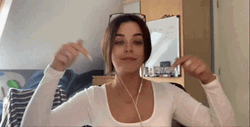 Cute Female Backhand Index Pointing Down GIF