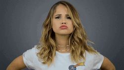 Cute Girl Offering Pouting Kisses GIF