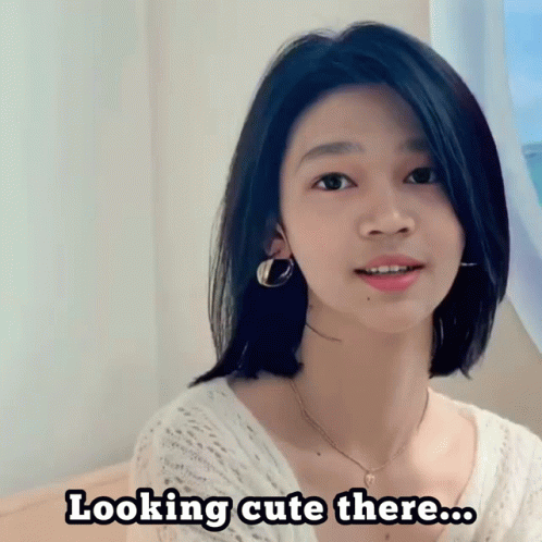 Cute Girl With Short Hair And Hoop Earrings GIF
