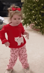 Cute Kid In Her Christmas Outfit Excited Dance GIF