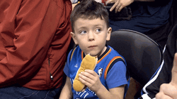 Cute Little Boy Chewing GIF