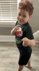 Cute Little Boy Doing Got It Pose GIF
