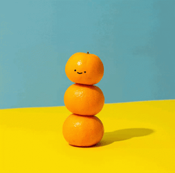 Cute Orange Smiling On Top Of Oranges GIF