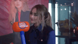 Cute Sabrina Carpenter Holding A Hammer GIF