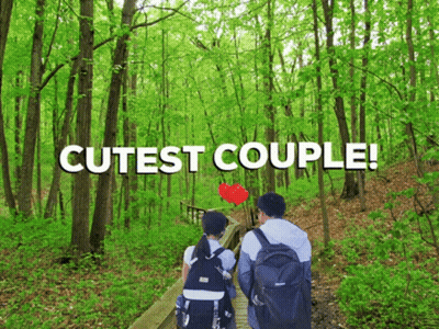 Cutest Couple Walking Through Forest GIF