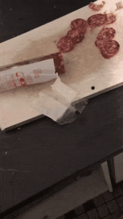 Cutting Board With Meat And Knife Labeled Beef GIF